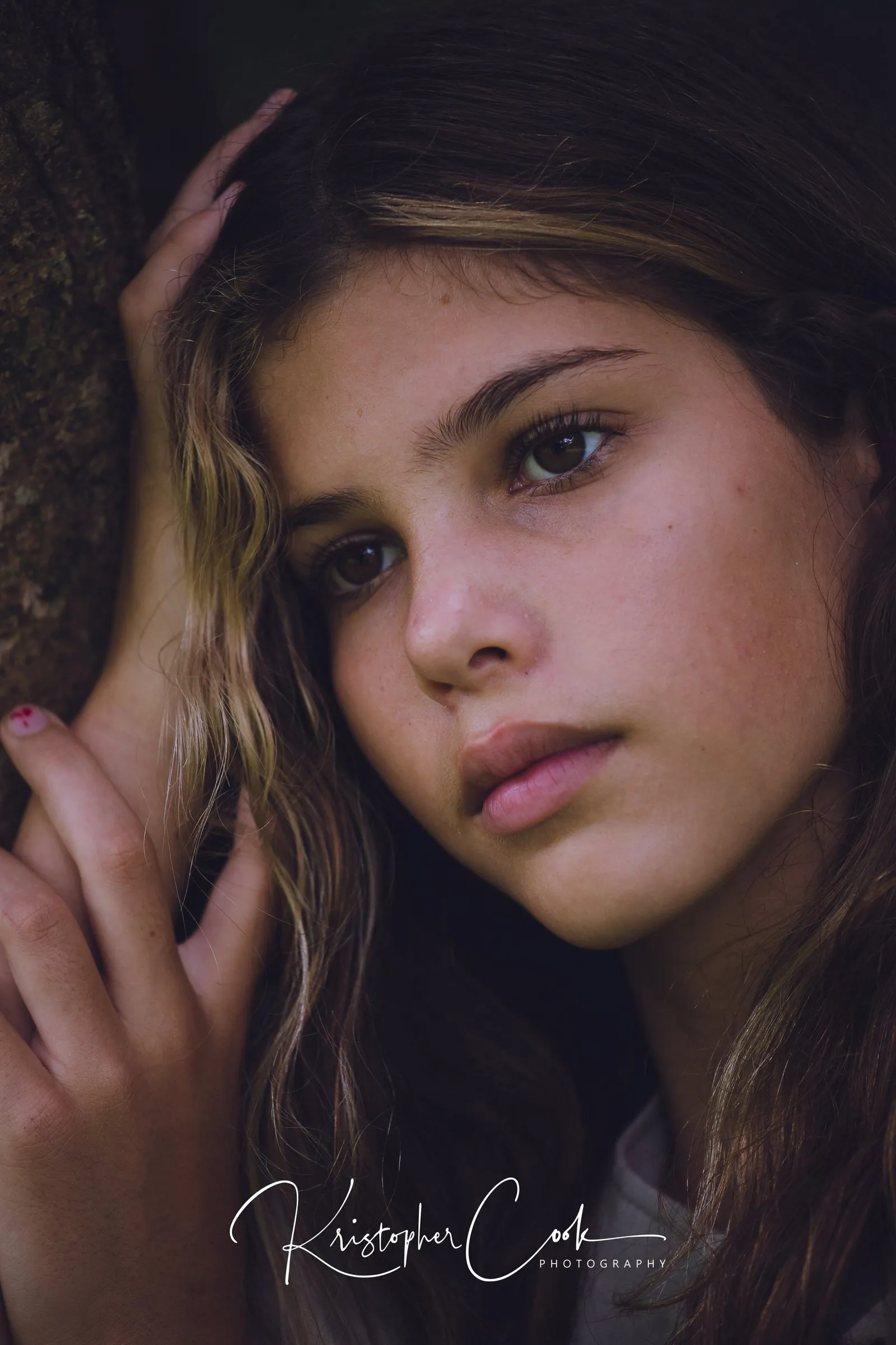 Portrait of a girl in soft light, photographed by Kris Cook