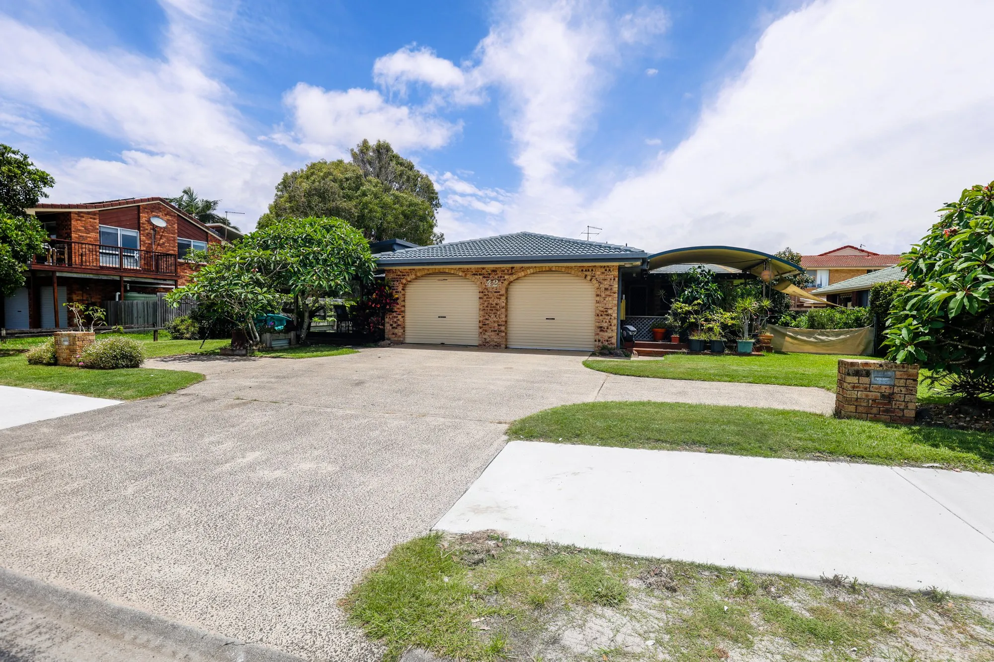 Street frontage of a brick home on a sunny day, Northern Rivers real estate photography by Kris Cook